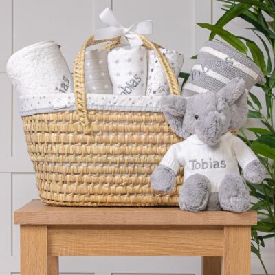 Personalised white and grey baby gift basket with grey elephant soft toy