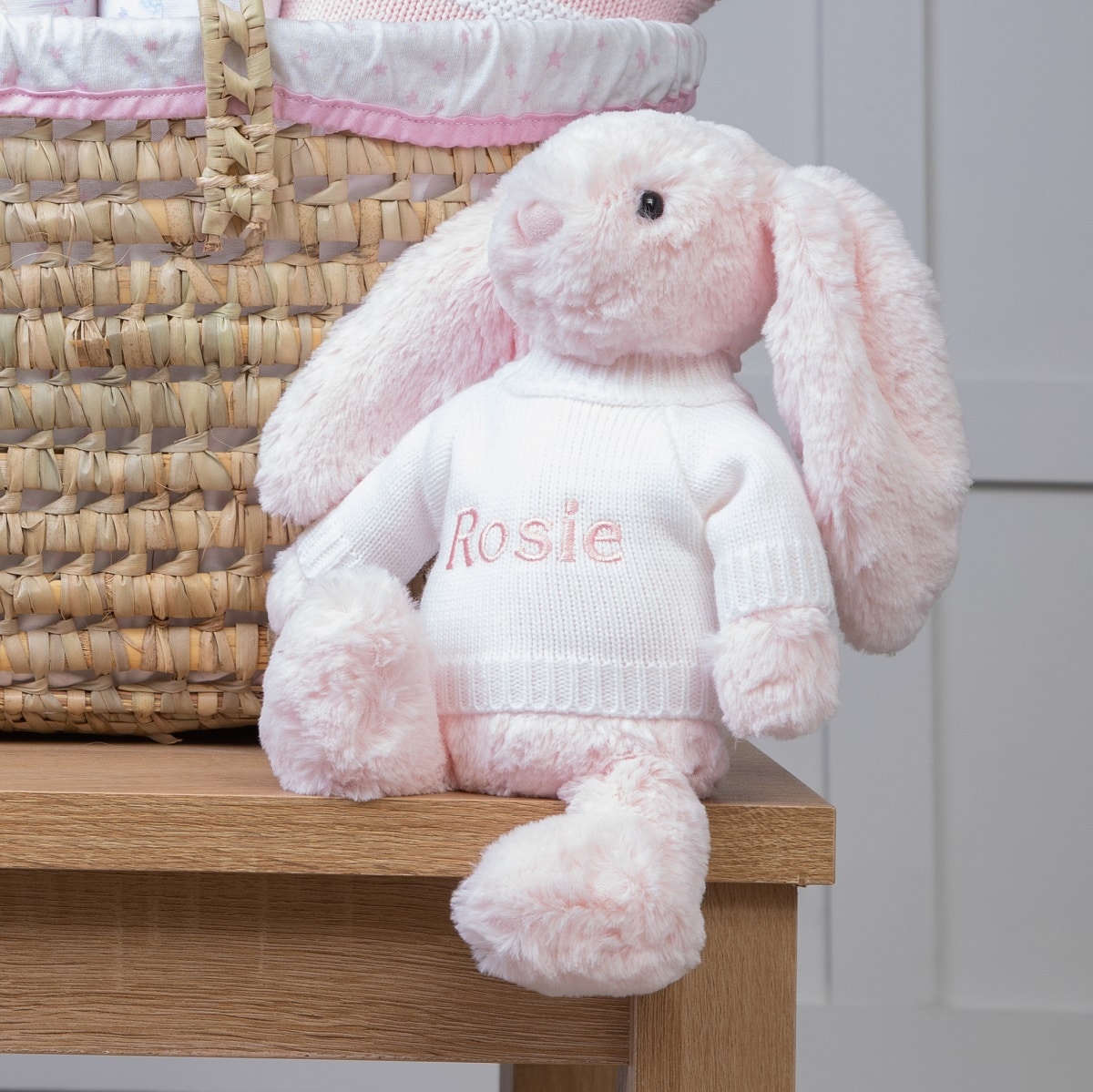 Personalised white and pink baby gift basket with pink bunny soft toy