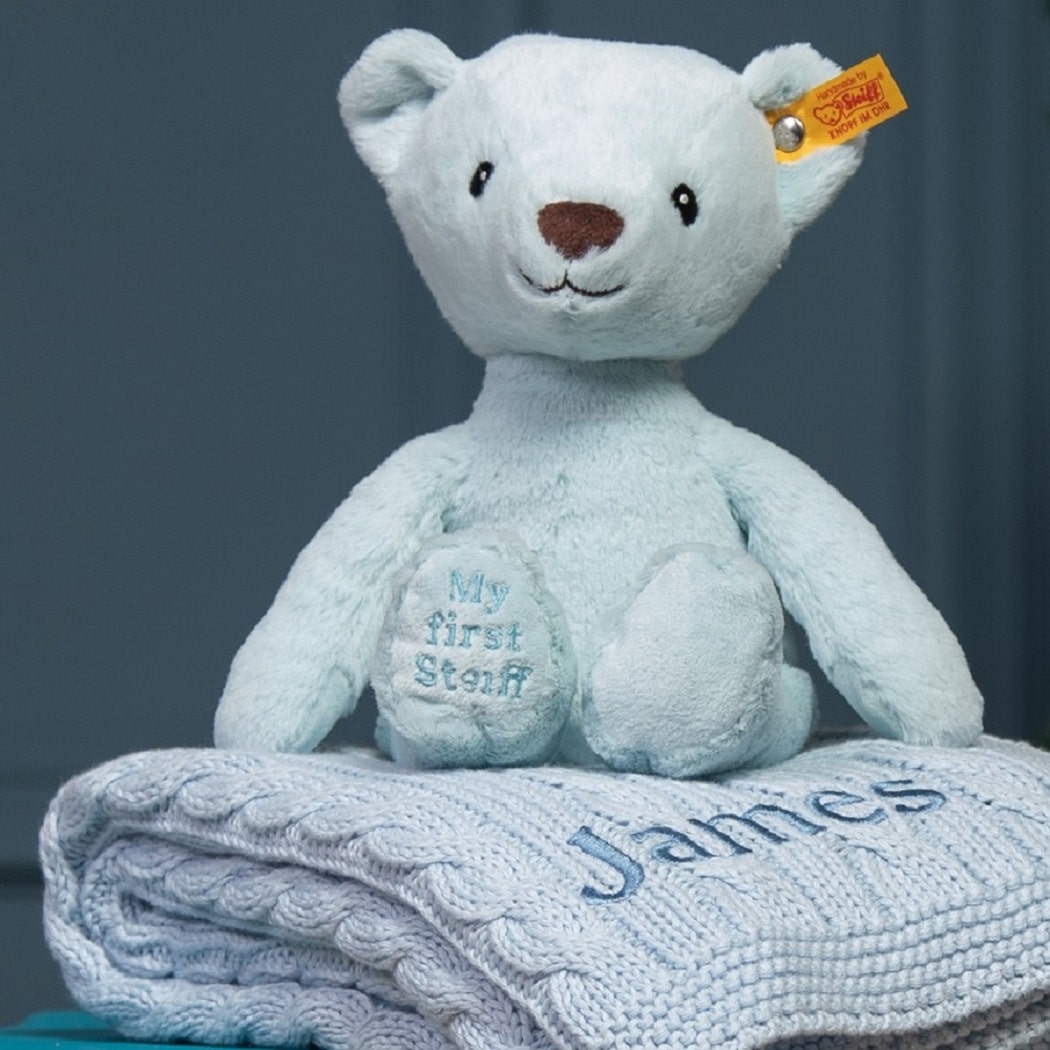 My First Steiff Teddy Bear blue soft toy and Toffee Moon luxury cable blanket gift set