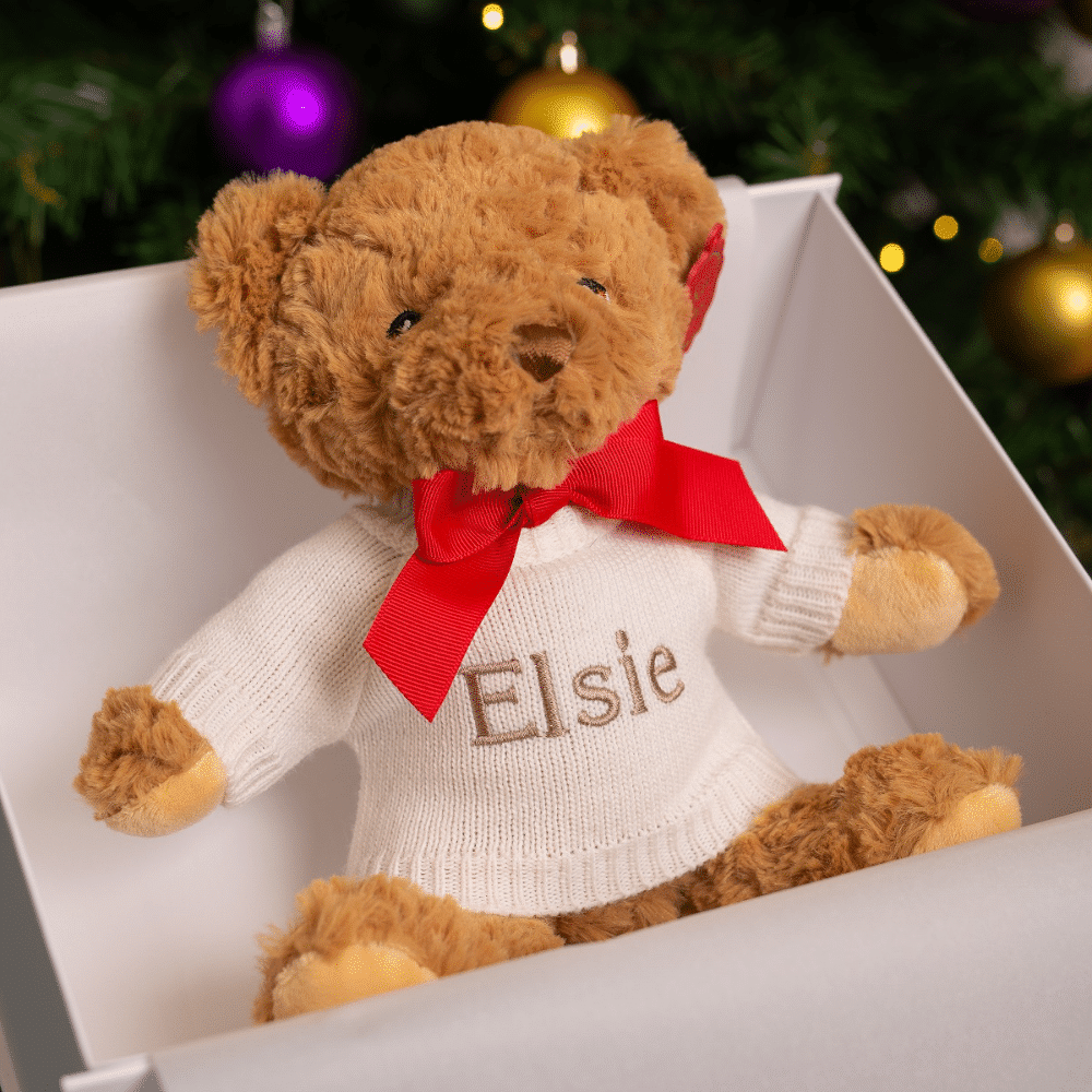 personalised elsie teddy bear with red bow in a gift box