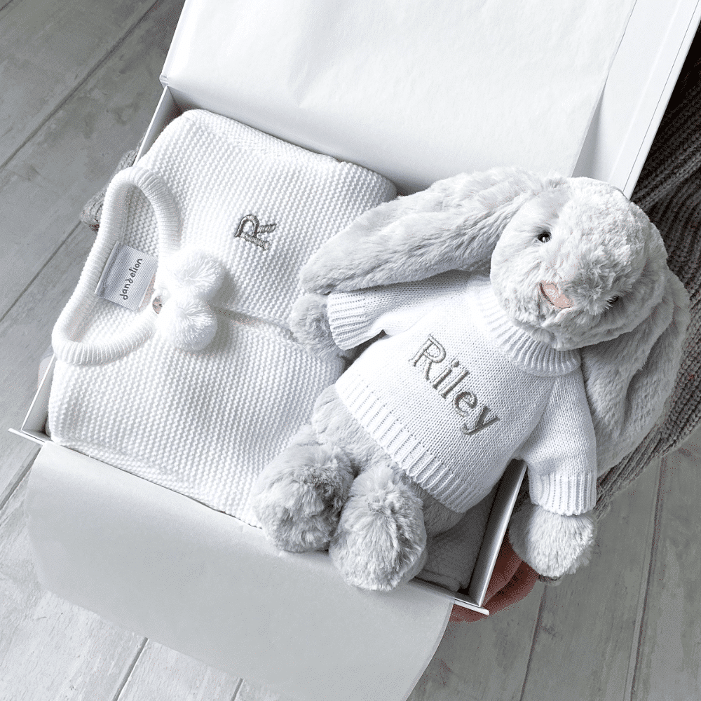 personalised white baby clothes and bunny teddy