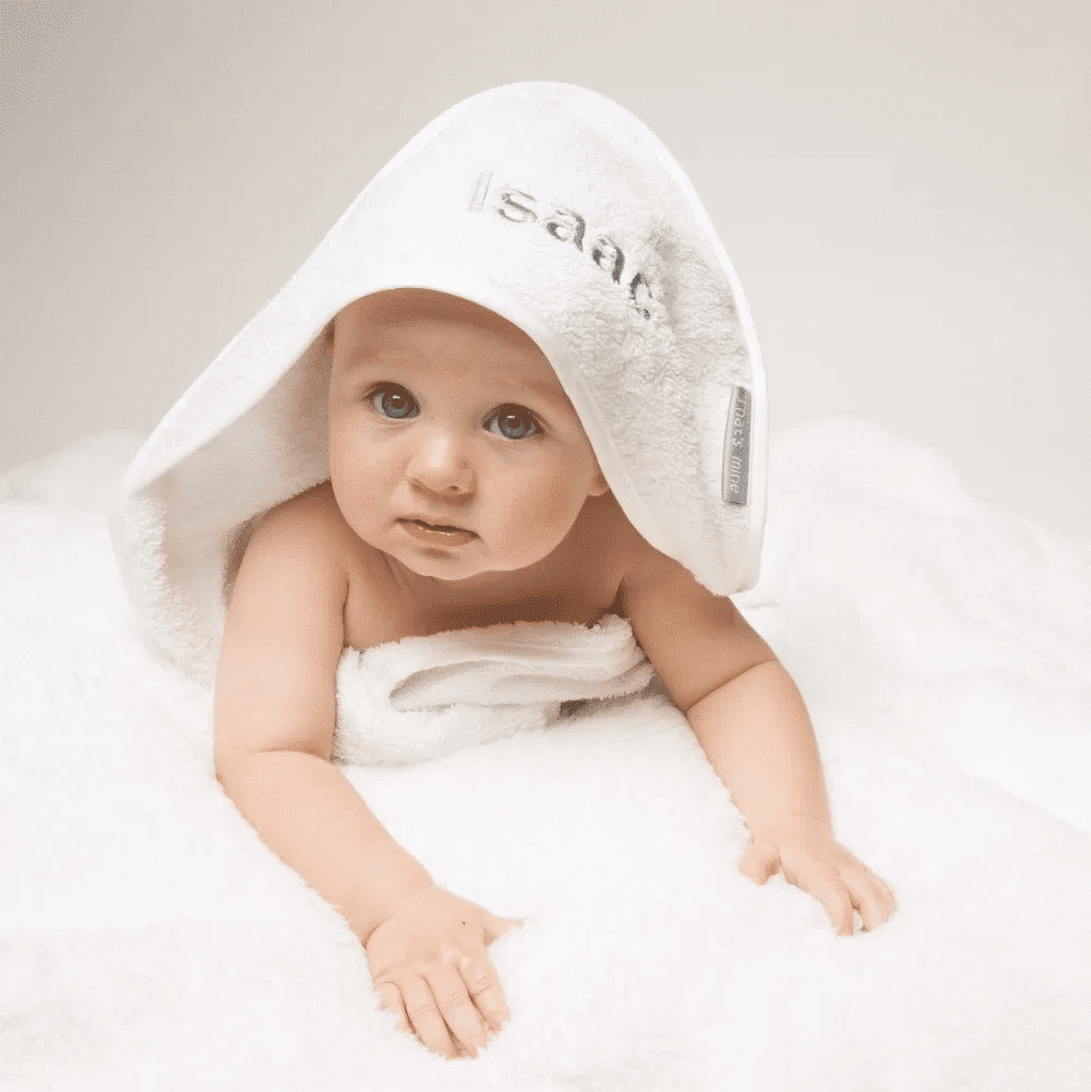 baby in white personalised towel