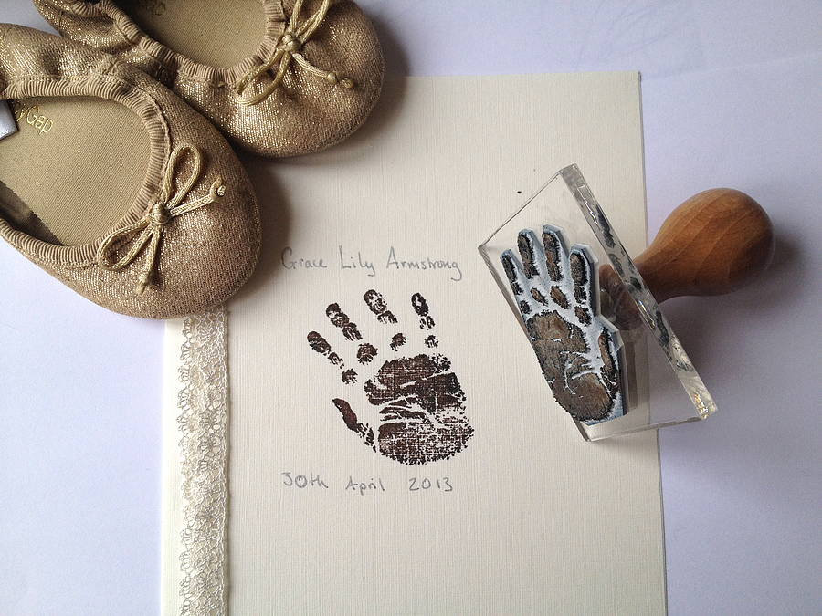 babys handprint stamp and shoes