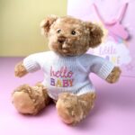 Keeleco recycled small Dougie gift bear soft toy with pink ‘Hello Baby’ jumper Baby Shower Gifts 3