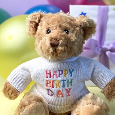 Keeleco recycled small Dougie gift bear soft toy with ‘HAPPY BIRTHDAY’ jumper in Capital letters 2
