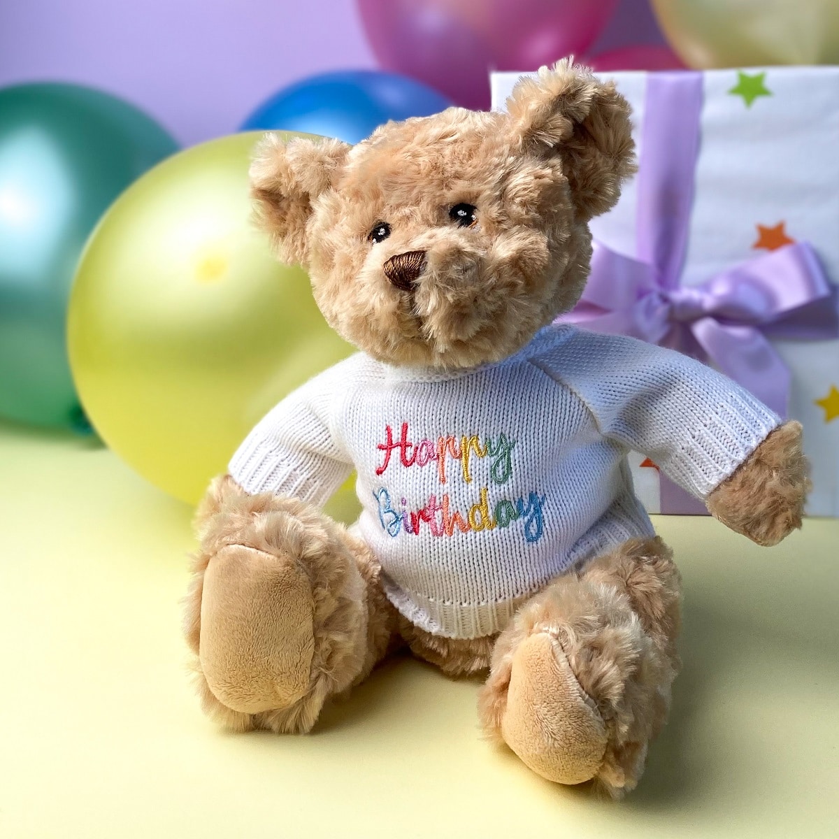 Keeleco recycled small Dougie gift bear soft toy with 'Happy Birthday' jumper