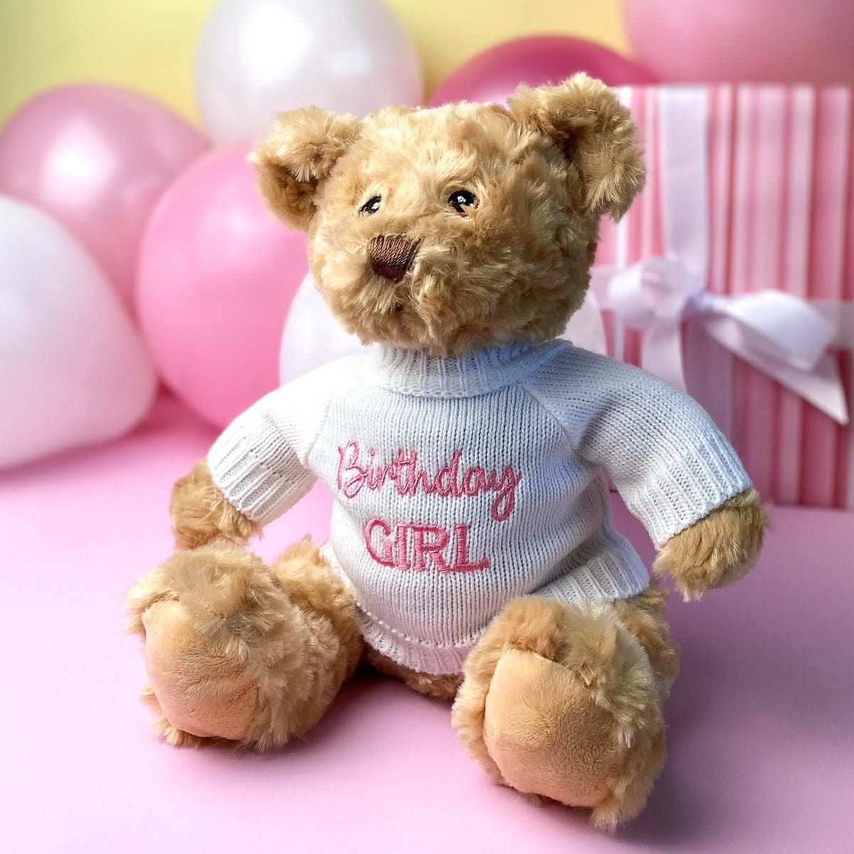 Keeleco recycled small Dougie gift bear soft toy with 'Birthday Girl' jumper