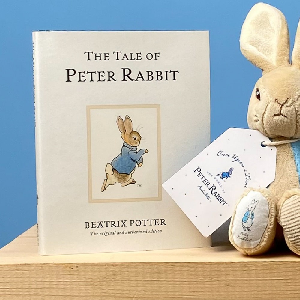 Peter Rabbit soft toy rattle and The tale of Peter Rabbit book