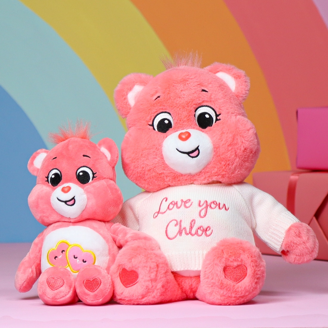 small and large pink care bear plush toy with personalised sweater